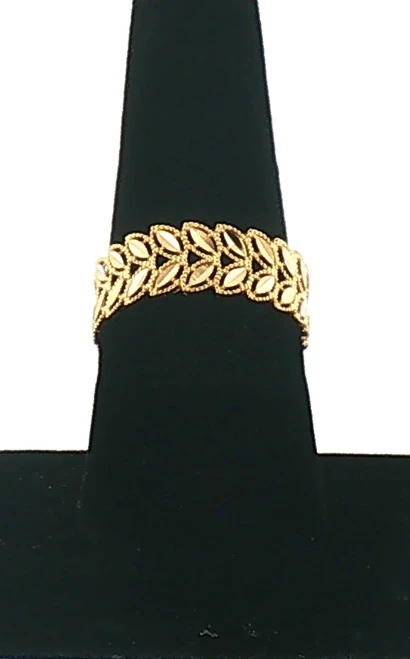 22KT yellow gold leaf motif wide band ring featuring intricate openwork detailing and textured overlapping leaves, weighing 2.5 grams, size 8.25.