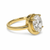 Three-quarter view of oval lab grown diamond engagement ring, 2.96 ct E/VVS2, 18K yellow gold floating frame, Karat 22