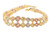 Detailed view of a 22K gold double-row filigree bracelet featuring interlocking textured openwork motifs arranged in an elegant lattice pattern. Yellow gold is complemented by contrasting rose and white-tone accents, creating a rich multi-tone appearance. The bracelet measures 7.5 inches, weighs approximately 13.1 grams, and is finished with a lobster-style clasp and adjustable link section.