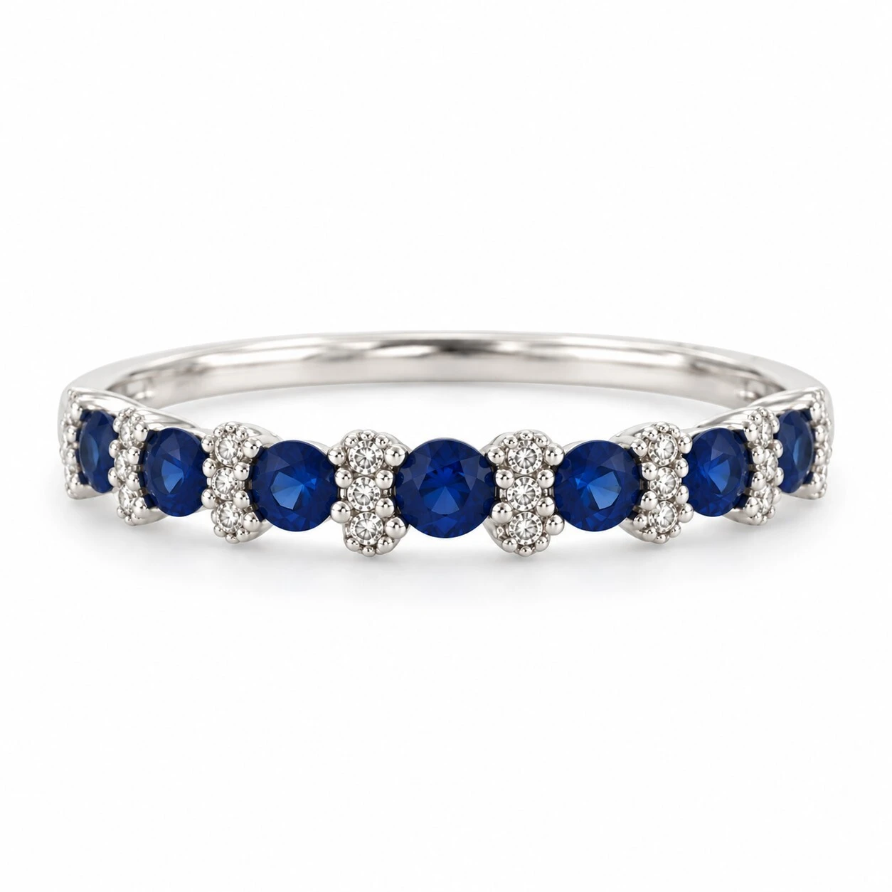 Royal blue sapphire and diamond stackable band ring in 18K white gold