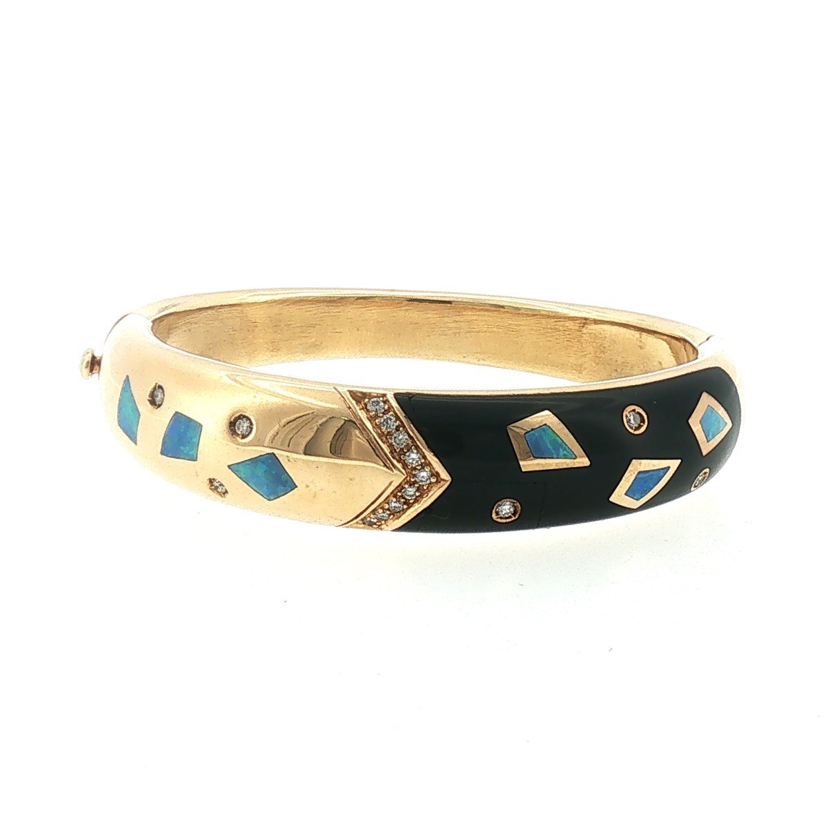Hinged 14K yellow gold bangle with a black enamel panel set with geometric opal inlays and a chevron of diamonds