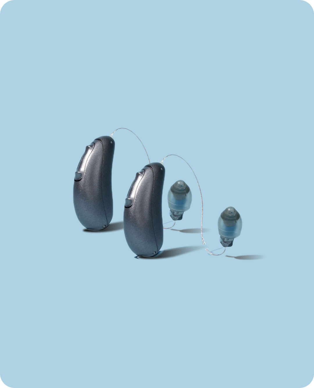 Pair of grey Spirit 2 hearing aids on blue background
