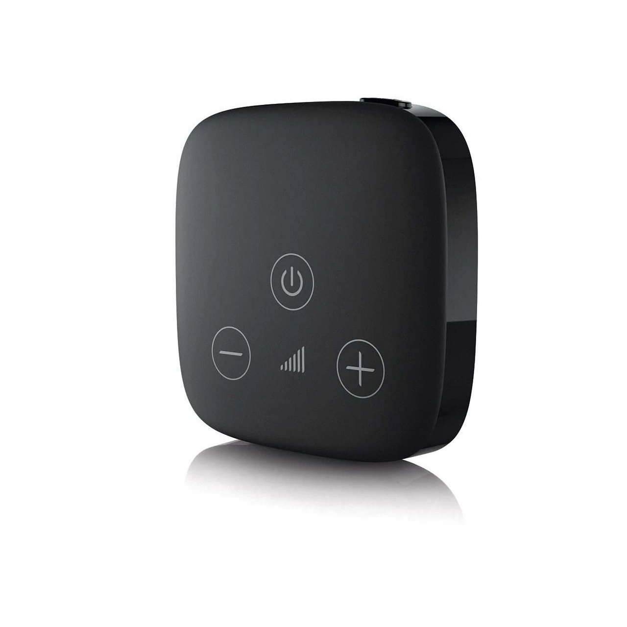 Black TV connector for hearing aids against white background