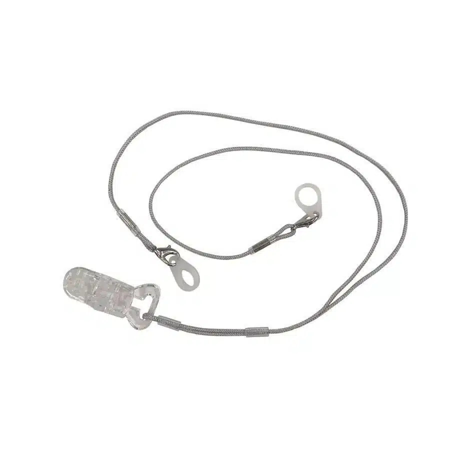 Hearing aid retention clip against white background