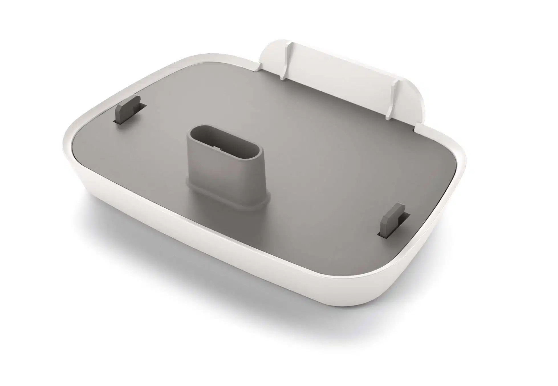 White exterior with gray interior power pack for hearing aids against white background