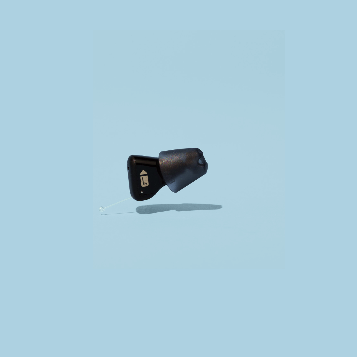 Mini single hearing aid (left)