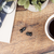 Audicus Mini Hearing Aids on Desk