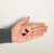 Audicus Mini Hearing Aids in Hand