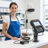 Ingenico iSC signature terminal with OEM power supply at retail counter