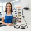 Ingenico iPP pin pad with OEM power supply plugged in at retail counter
