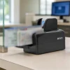 Digital Check TellerScan TS250-55 with checks loaded in the 100 item feeder on a teller counter