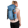 Woman wearing Ultimate Direction FastpackHer 30, rear view
