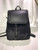 Jessica Simpson Kaelo Black Drawstring Backpack with flap faux fur