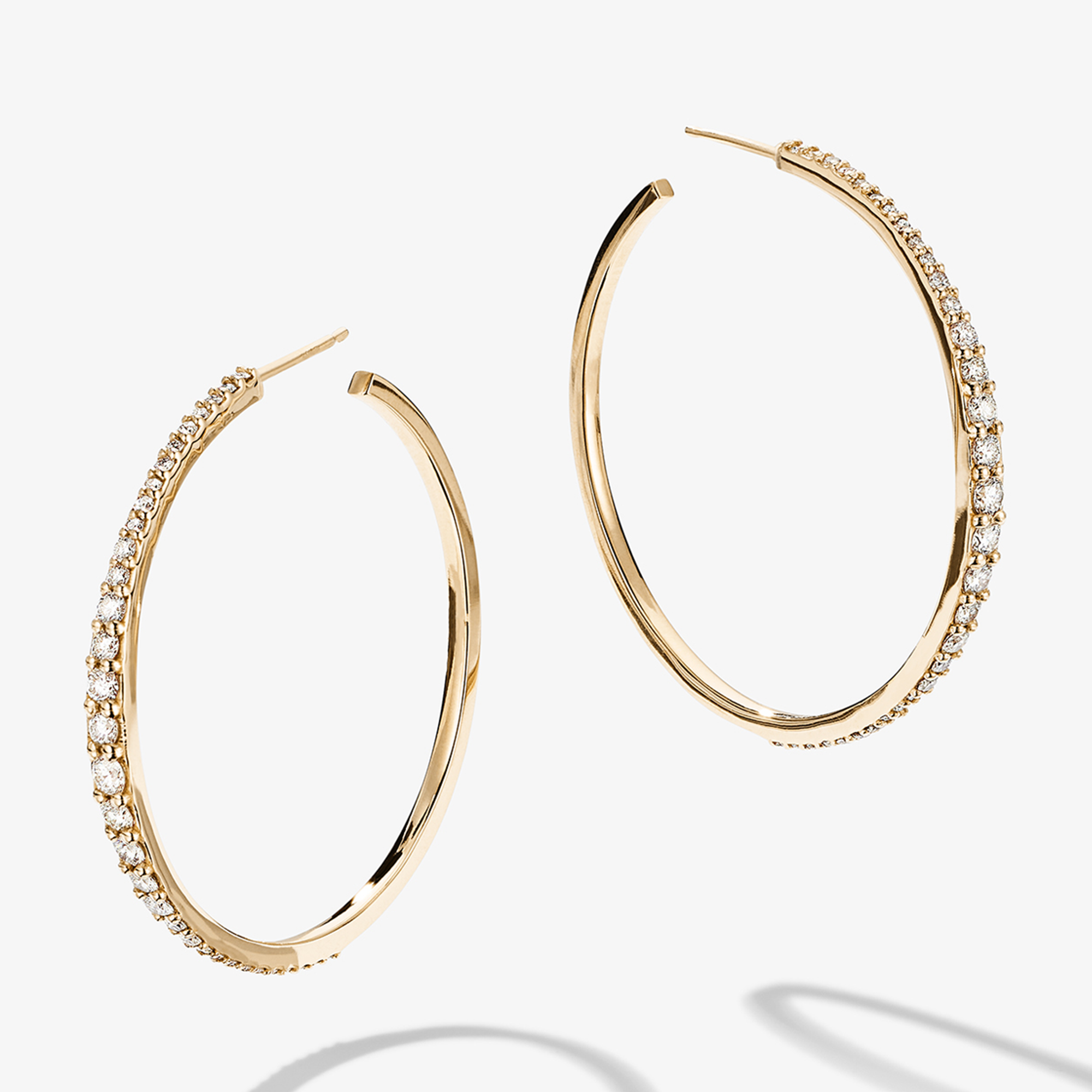 14K yellow gold small graduating diamond hoops