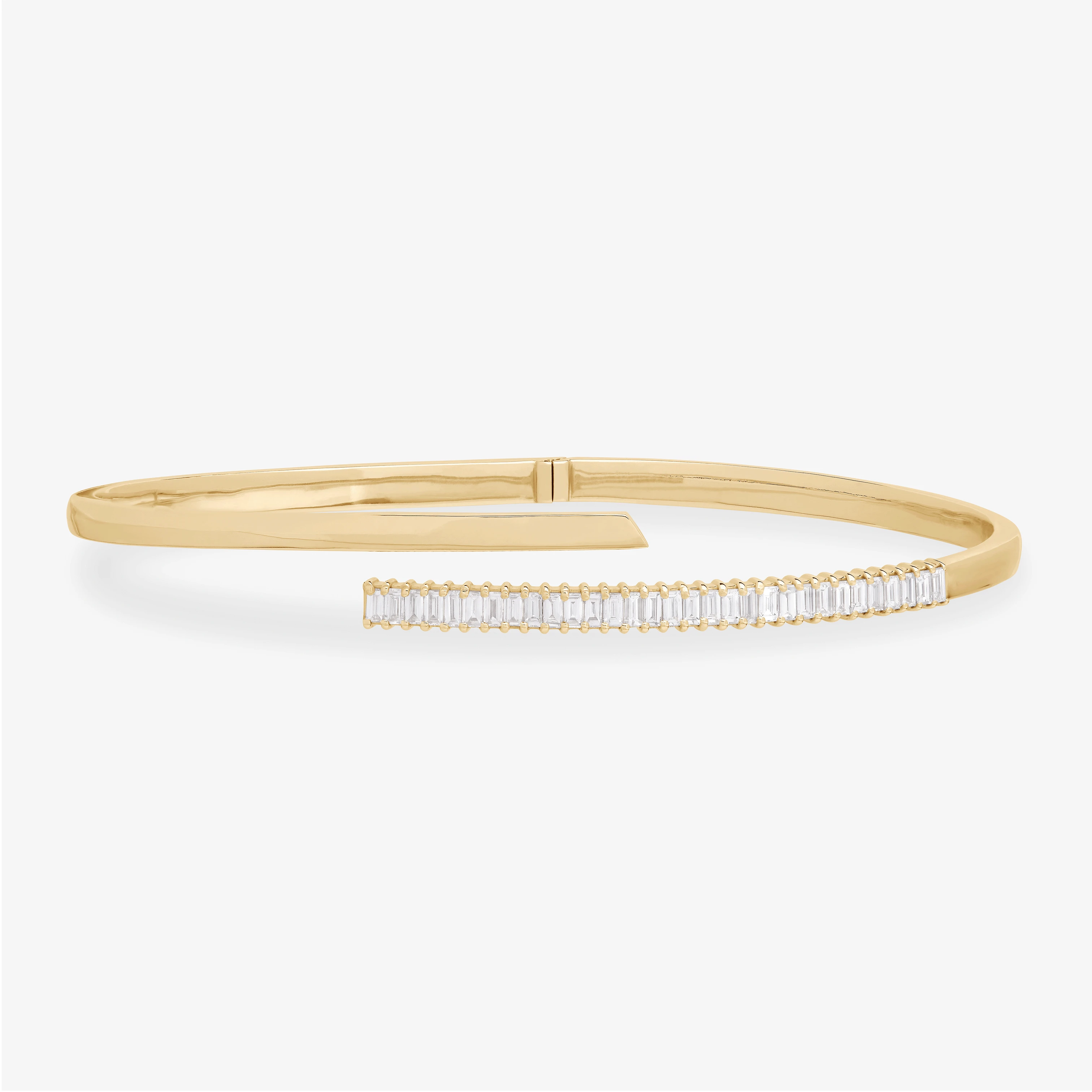 14K yellow gold criss cross baguette diamond bangle