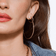 Large solo diamond sunrise hoops - on model