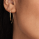 Small flat hooked on hoop with diamonds - on model