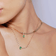 Green emerald & pear diamond necklace - on model