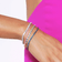 Thin pink sapphire tennis bracelet - on model