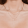 Double strand cross charm necklace - on model