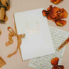 Wedding Vow Keepsake Book by Blue Sky Papers - White silk with Floral Wreath emblem in Rose Gold