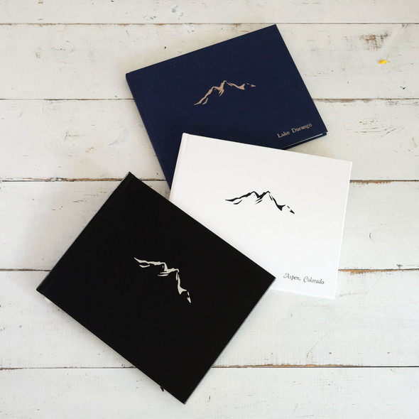 Cabin Guest Book - Black leather, White leather, and Navy satin - by Blue Sky Papers Cabin Guest Book - Black leather, White leather, and Navy satin - by Blue Sky Papers
