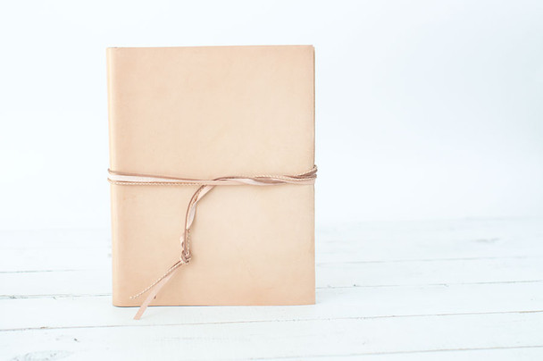 Leather Book with Tri-Leather Strap - snow leather custom book with tri-leather strap closure - by Blue Sky Papers