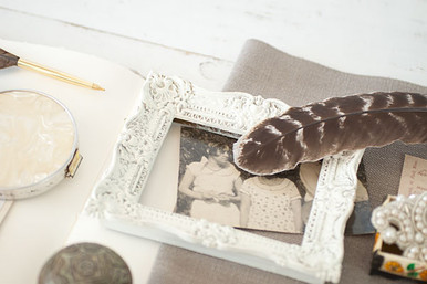 Include old family photographs of your mother alongside a recent photo of her in your family heirloom album