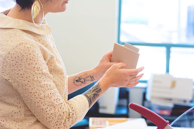 Amy Sarrell, Blue Sky Papers bookbindress, hosted the bookbinding workshop at the East Atlanta Library