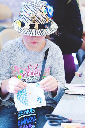 participants of all ages attended the book binding workshop at the East Atlanta Library