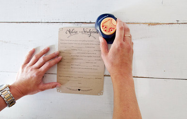 Use a corner punch to add decorative details to your wedding mad libs