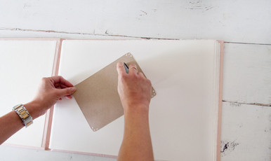 Use double stick adhesive to attach your mad-libs to the pages of your wedding guestbook