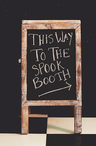 Use a Chalkboard Sign to point the way to your Halloween Party Photo Booth