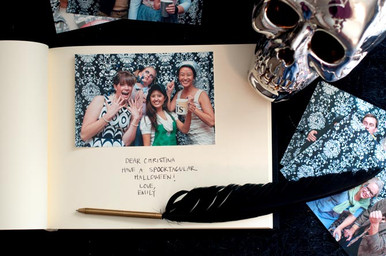 A black feather quill pen is the perfect writing accessory for your Halloween Party Photo Booth