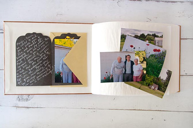 Grandparent Gift Ideas - personalize a photo album with the family name and send along a heartfelt note with some photos to start the album off right.