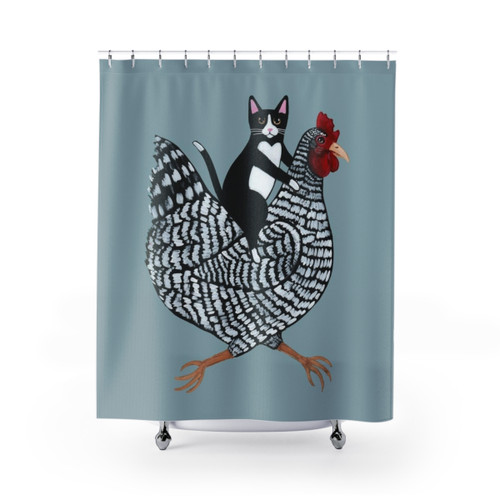 Tuxedo cat riding a chicken on a funny shower curtain