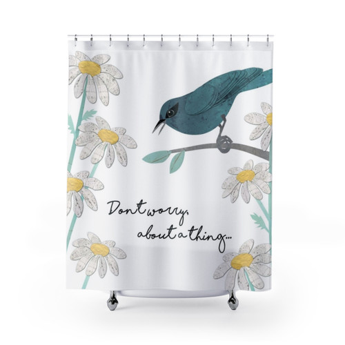 Teal bird shower curtain with a collage of birds, daisies, and inspirational imagery