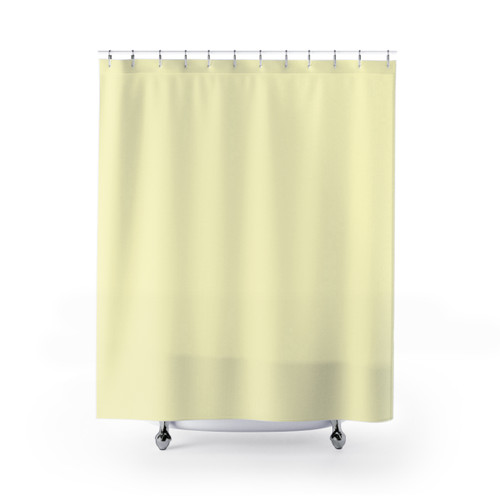 Pastel yellow shower curtain with lemon meringue design