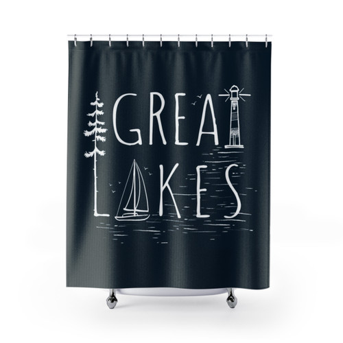 Great Lakes-themed shower curtain with sailboat and lighthouse motifs