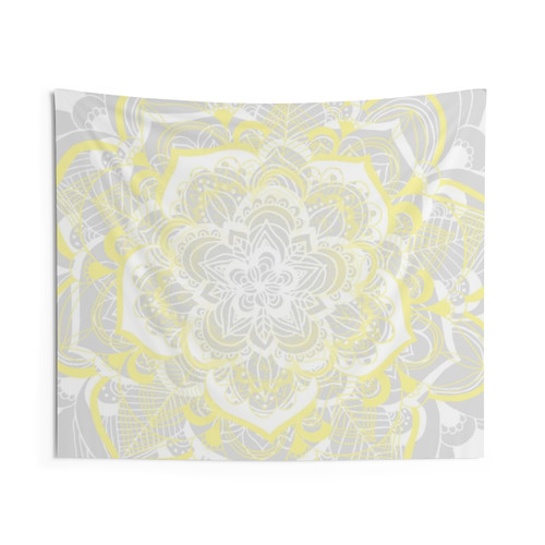 Woven mandala tapestry in yellow, grey, and white