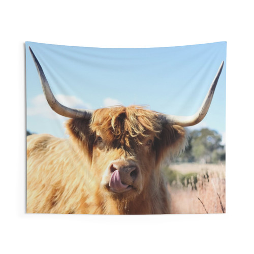 Tongue out highland cow tapestry