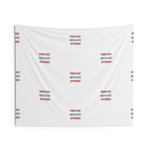 Motivational tapestry featuring the quote Practice Reckless Optimism