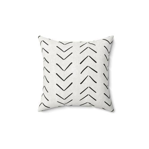 Boho decorative throw pillow with black and white arrow design