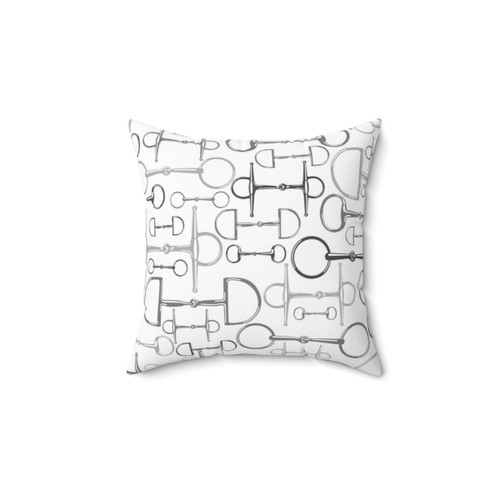 Gray and white pillow with horse bit design