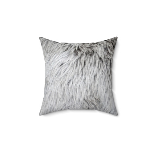 Close-up of grey faux fur pillow