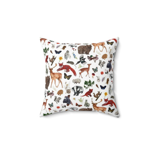 Cozy woodland animal throw pillow featuring bears, foxes, deer, and more