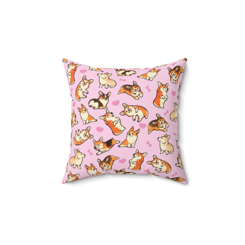 Adorable corgi pillow with a pink pattern design