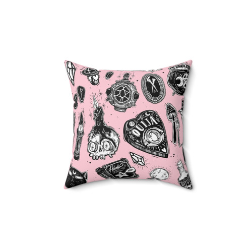 Witchy decorative pillow with spooky pattern