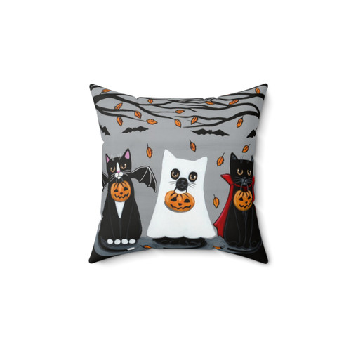 Whimsical Halloween cat pillow with black cats, bats, and pumpkins