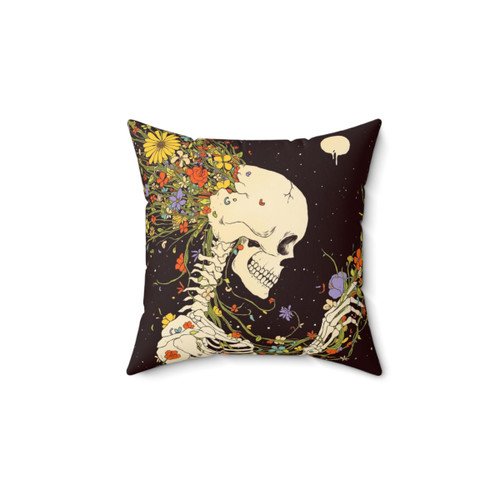 Surreal skeleton pillow with floral and galaxy motifs